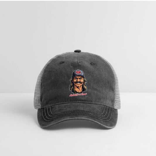 Smiling man with mustache and RN cap